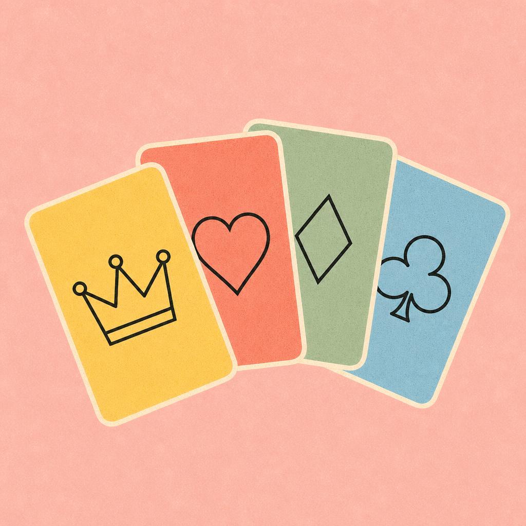 Four Queerdom suit cards fanned out: crown, heart, diamond, clover